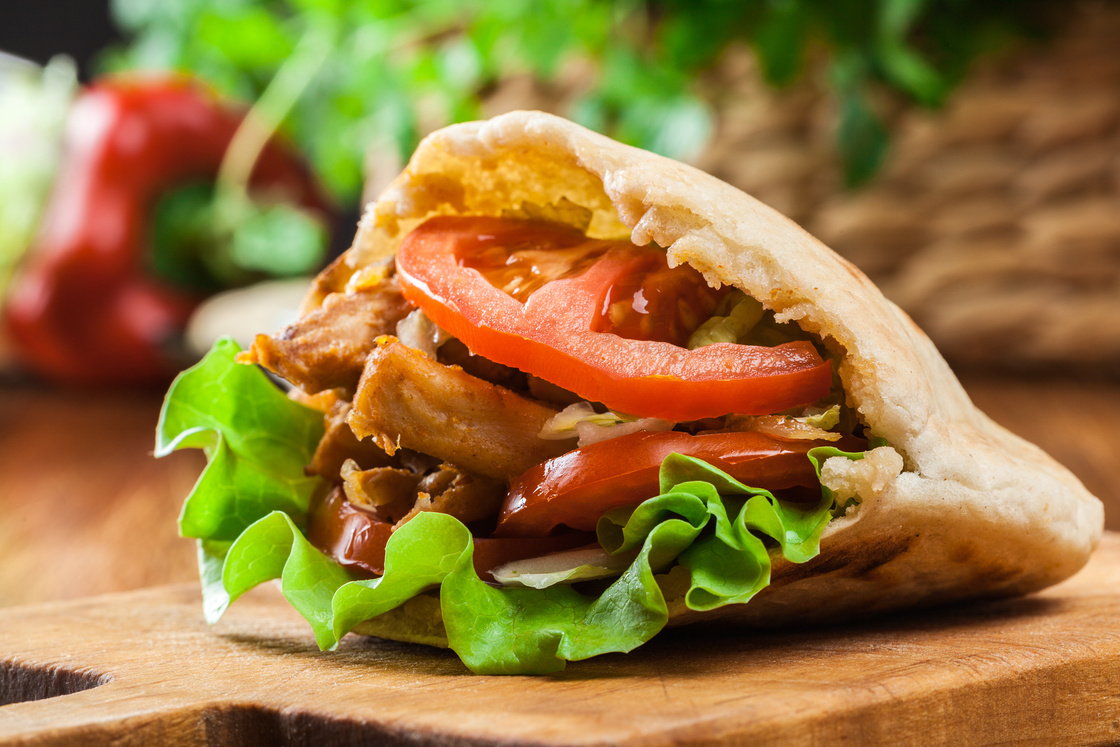 Doner kebab - fried chicken meat with vegetables